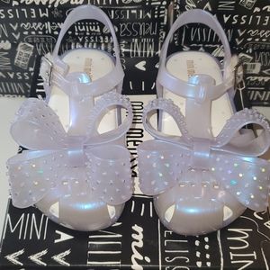 Mini Melissa 9T EUC iridescent with bow